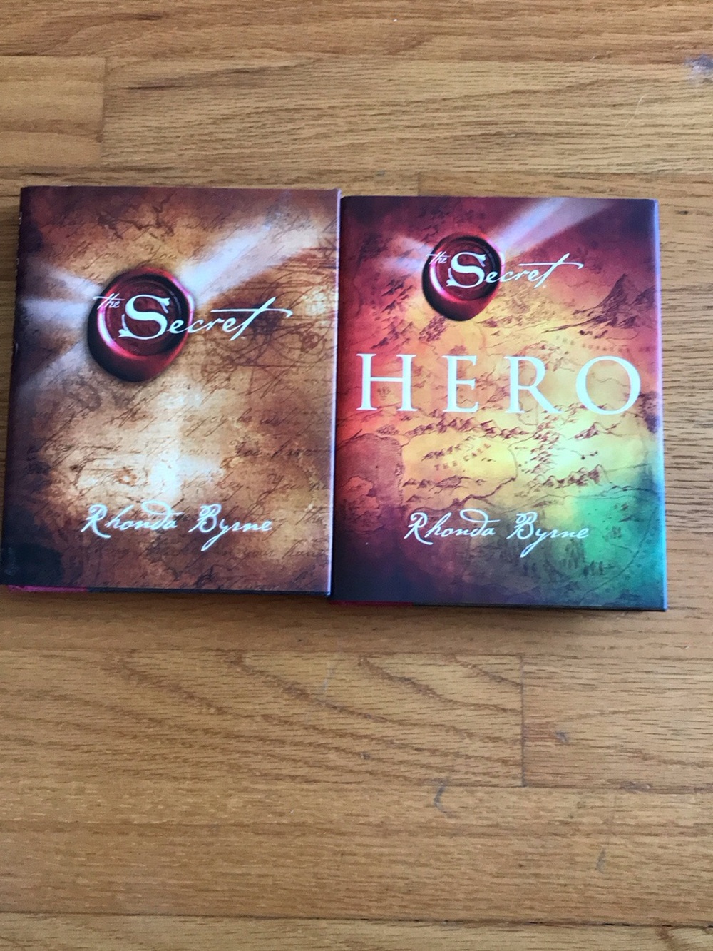 The Secret & The Secret: Hero by Rhonda Byrne - Brown/Red Gradient Covers